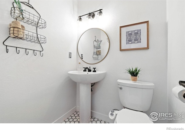 3850 Broadway St Unit 24, Boulder, CO 80304 - half bathroom with toilet and baseboards