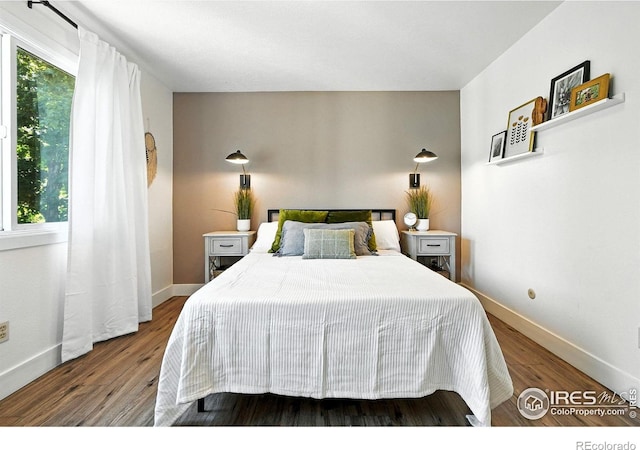 3850 Broadway St Unit 24, Boulder, CO 80304 - bedroom featuring wood finished floors and baseboards