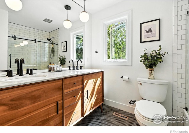 3850 Broadway St Unit 24, Boulder, CO 80304 - full bath featuring double vanity, tiled shower, and tile patterned floors