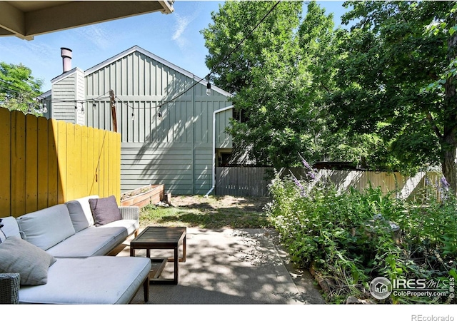 3850 Broadway St Unit 24, Boulder, CO 80304 - fenced backyard with outdoor lounge area and a patio area