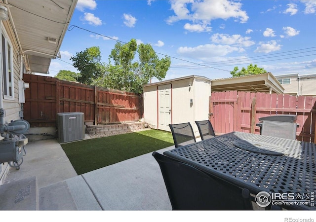 1119 Milky Way, Thornton, CO 80260 - fenced backyard with a patio area, a shed, and outdoor dining area