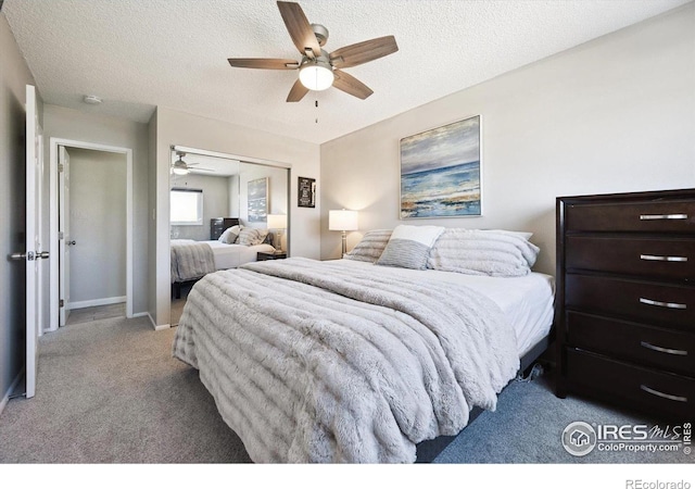 1119 Milky Way, Thornton, CO 80260 - bedroom featuring carpet flooring, a closet, a textured ceiling, and ceiling fan