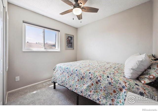 1119 Milky Way, Thornton, CO 80260 - carpeted bedroom with a textured ceiling and ceiling fan