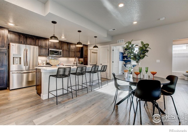 265 High Point Dr Unit 202, Longmont, CO 80504 - dining room with light wood-style flooring and recessed lighting