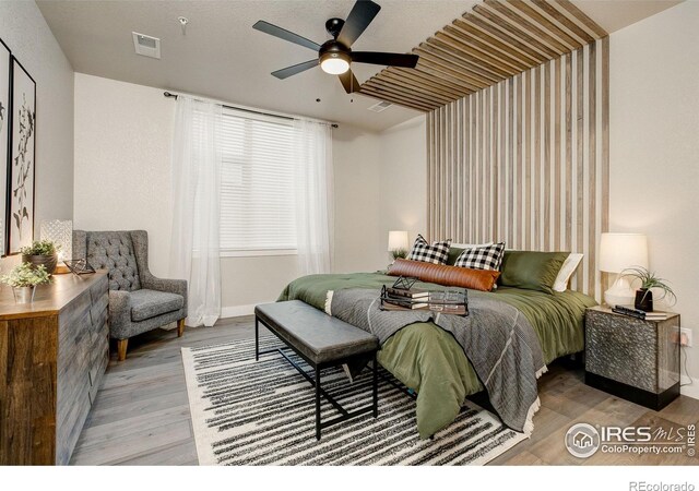 265 High Point Dr Unit 202, Longmont, CO 80504 - bedroom with wood finished floors and ceiling fan