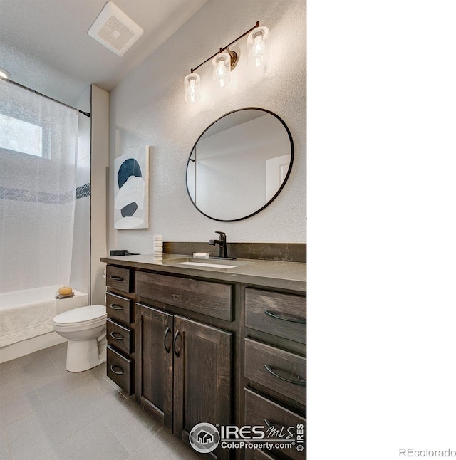 265 High Point Dr Unit 202, Longmont, CO 80504 - bathroom featuring vanity, shower / tub combination, and tile patterned flooring
