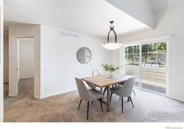 5124 Stillwater Creek Dr Unit E, Fort Collins, CO 80528 - dining room featuring light carpet and baseboards