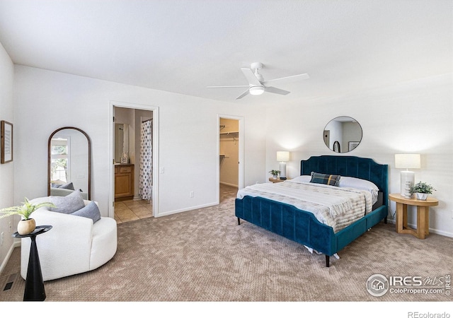 5124 Stillwater Creek Dr Unit E, Fort Collins, CO 80528 - bedroom with carpet floors, a walk in closet, ensuite bath, and a ceiling fan