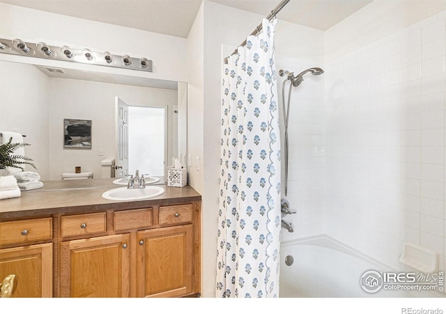 5124 Stillwater Creek Dr Unit E, Fort Collins, CO 80528 - bathroom featuring shower / tub combo and vanity