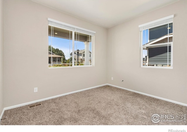 6818 Whisper Trail Ln, Wellington, CO 80549 - carpeted spare room featuring baseboards