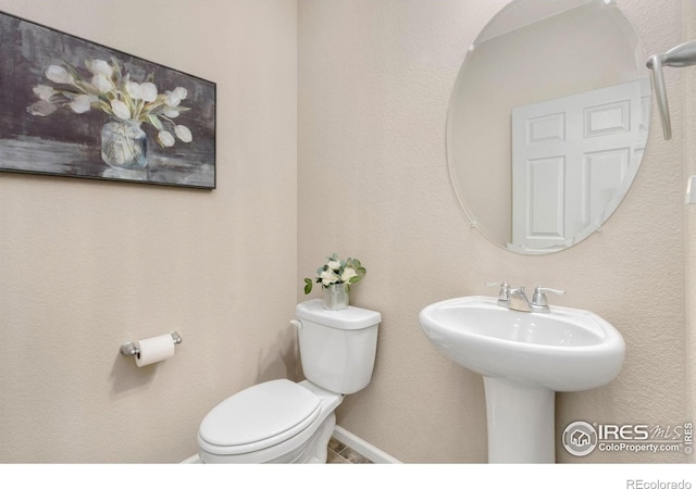 6818 Whisper Trail Ln, Wellington, CO 80549 - half bath with toilet and a sink