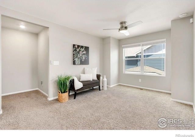 6818 Whisper Trail Ln, Wellington, CO 80549 - living area featuring carpet floors and ceiling fan