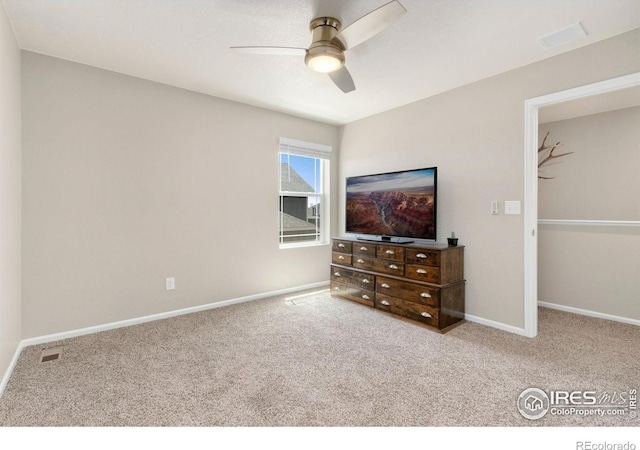 6818 Whisper Trail Ln, Wellington, CO 80549 - carpeted bedroom with baseboards and a ceiling fan