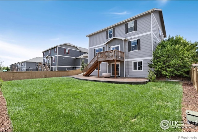 6818 Whisper Trail Ln, Wellington, CO 80549 - back of property featuring a wooden deck, stairway, and a patio