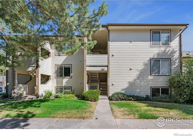 3465 Lochwood Dr Unit N-61, Fort Collins, CO 80525 - view of building exterior with stairs