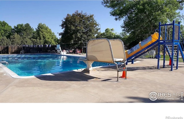 3465 Lochwood Dr Unit N-61, Fort Collins, CO 80525 - view of swimming pool with a patio