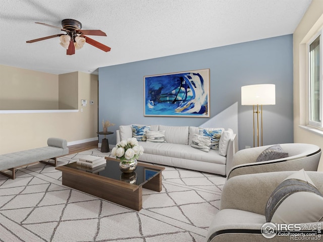 18931 E Brunswick Pl, Aurora, CO 80013 - living area with a ceiling fan, a textured ceiling, and wood finished floors