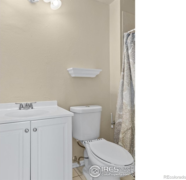 18931 E Brunswick Pl, Aurora, CO 80013 - bathroom with vanity and tile patterned flooring