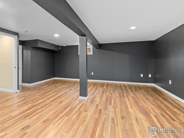 18931 E Brunswick Pl, Aurora, CO 80013 - finished basement featuring wood finished floors and recessed lighting