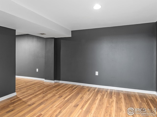 18931 E Brunswick Pl, Aurora, CO 80013 - spare room with wood finished floors and recessed lighting