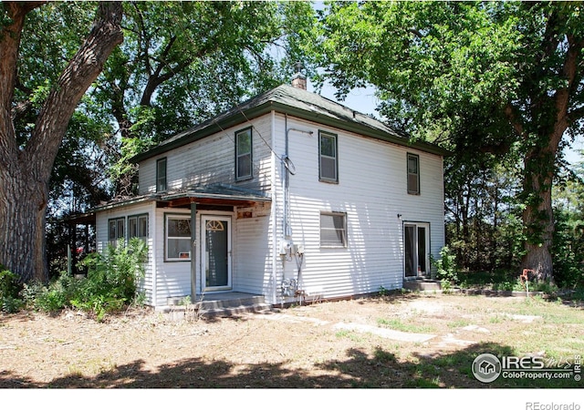 19089 Chambers Dr, Sterling, CO 80751 - view of front of home with a chimney