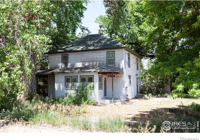 19089 Chambers Dr, Sterling, CO 80751 - view of front of house with a chimney