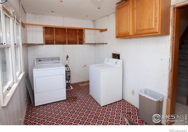 19089 Chambers Dr, Sterling, CO 80751 - washroom with cabinet space and tile patterned floors