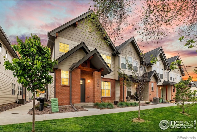 5223 Allison Way Unit D, Arvada, CO 80002 - craftsman house with brick siding and a front lawn