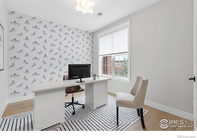 5223 Allison Way Unit D, Arvada, CO 80002 - office area featuring light wood-type flooring and wallpapered walls