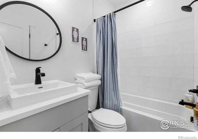 5223 Allison Way Unit D, Arvada, CO 80002 - bathroom featuring shower / bath combo with shower curtain and vanity