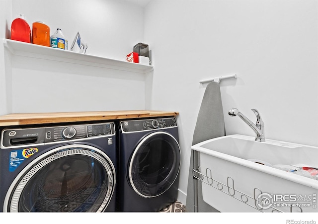 5223 Allison Way Unit D, Arvada, CO 80002 - washroom with washer and clothes dryer