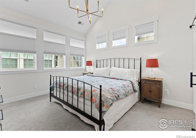 5223 Allison Way Unit D, Arvada, CO 80002 - bedroom with a chandelier, high vaulted ceiling, and carpet flooring