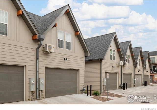 5223 Allison Way Unit D, Arvada, CO 80002 - view of property exterior with roof with shingles and board and batten siding