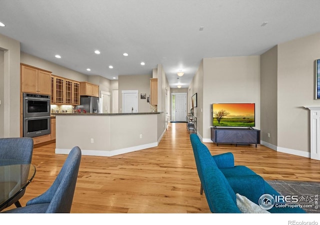 3031 Thunder Lake Cir, Lafayette, CO 80026 - living area featuring light wood-type flooring and recessed lighting