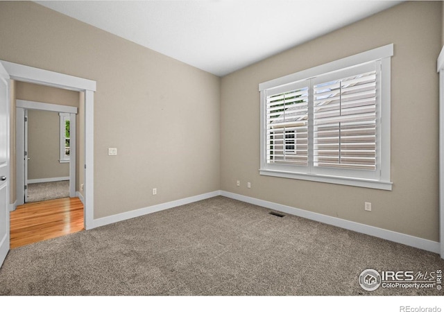 3031 Thunder Lake Cir, Lafayette, CO 80026 - carpeted spare room featuring baseboards