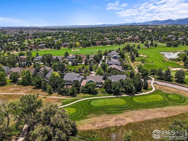 3031 Thunder Lake Cir, Lafayette, CO 80026 - aerial perspective of suburban area featuring a golf course and a water and mountain view