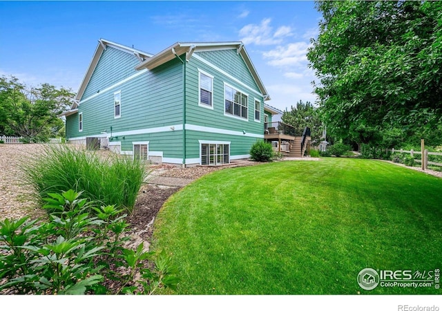 3031 Thunder Lake Cir, Lafayette, CO 80026 - view of side of property featuring stairs and a wooden deck