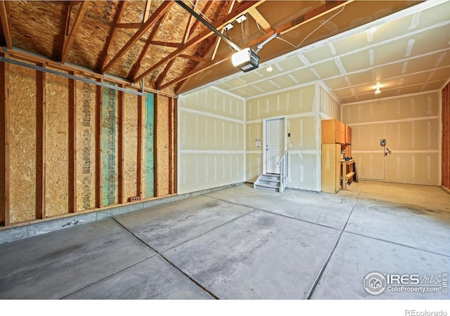 3031 Thunder Lake Cir, Lafayette, CO 80026 - garage featuring a garage door opener