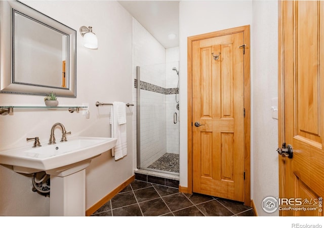 6771 Crooked Stick Dr, Windsor, CO 80550 - full bath featuring a shower stall and tile patterned flooring