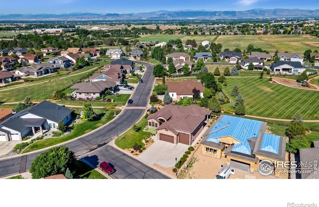 973 Skipping Stone Ct, Timnath, CO 80547 - aerial perspective of suburban area with a mountainous background