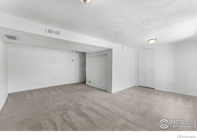 114 Berwick Ave, Firestone, CO 80520 - unfurnished room featuring carpet floors and a textured ceiling