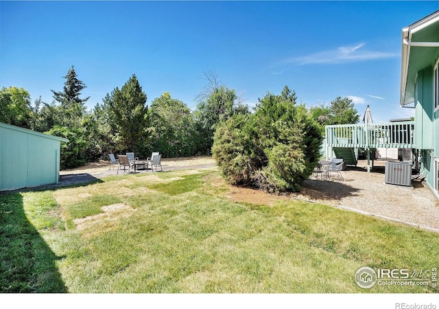3066 W 134th Ct, Broomfield, CO 80020 - view of grassy yard featuring a patio area