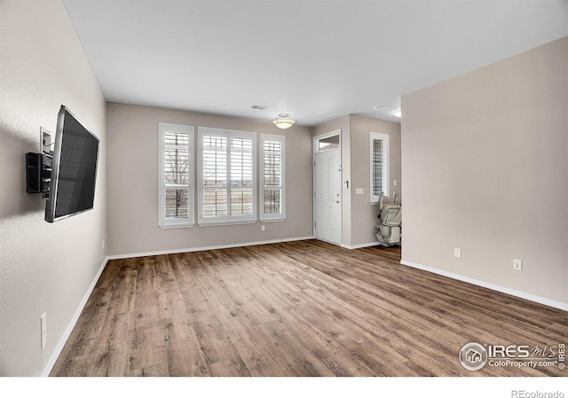 9266 W 107th Ln, Broomfield, CO 80021 - spare room featuring wood finished floors and baseboards