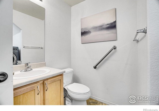 9266 W 107th Ln, Broomfield, CO 80021 - bathroom featuring vanity and toilet