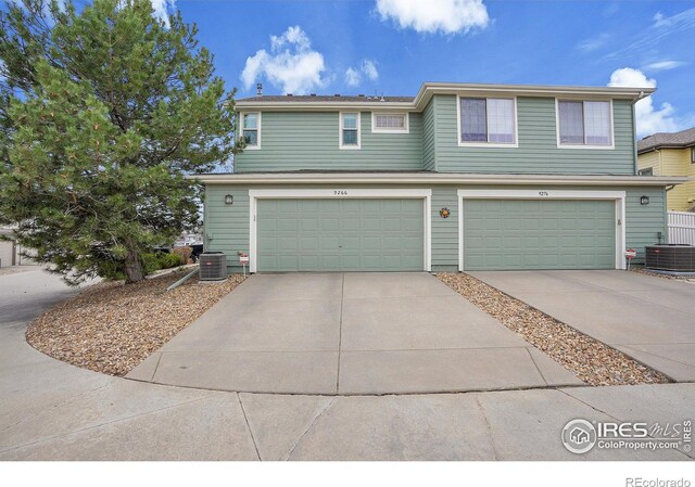 9266 W 107th Ln, Broomfield, CO 80021 - view of front facade with concrete driveway and an attached garage