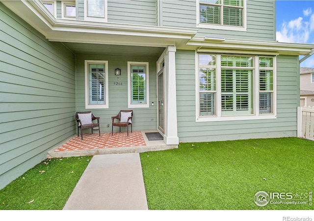 9266 W 107th Ln, Broomfield, CO 80021 - view of exterior entry featuring a porch