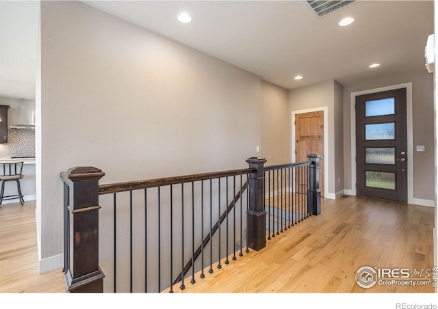 6928 Summerwind Ct, Timnath, CO 80547 - foyer featuring wood finished floors and recessed lighting