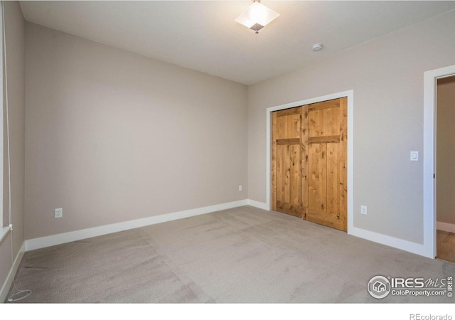 6928 Summerwind Ct, Timnath, CO 80547 - unfurnished bedroom featuring carpet and a closet