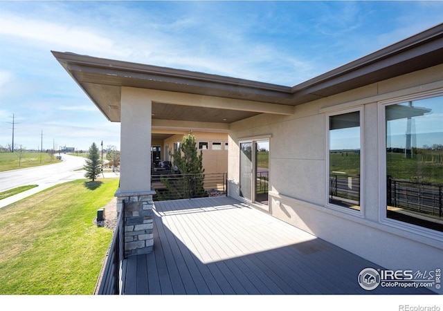 6928 Summerwind Ct, Timnath, CO 80547 - deck featuring a lawn