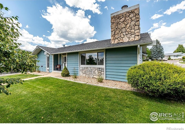 14 Douglas Dr N, Broomfield, CO 80020 - ranch-style house featuring a chimney, a front yard, and roof with shingles